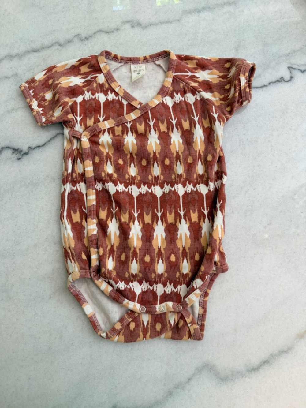 kate quinn Rust and Cream Ikat Wrap Baby Bodysuit